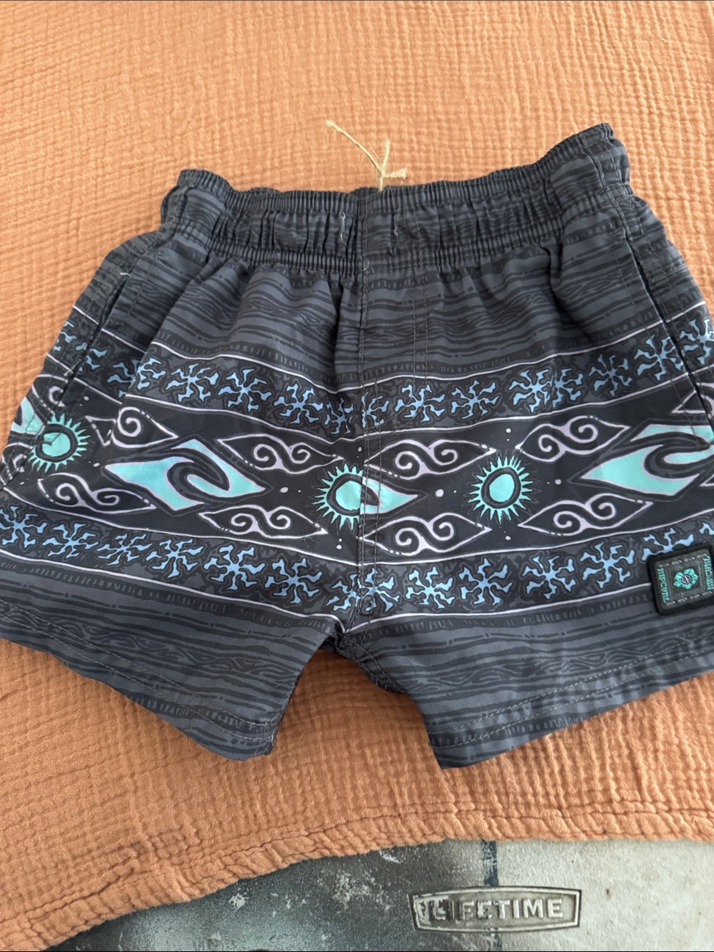 Rip Curl Black Swim Shorts with Teal Tribal Stripe